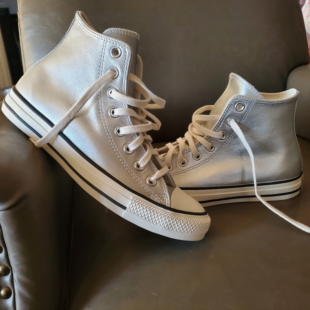 Silver High-Top Converse All-Stars Sneakers